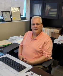 Rick Jeffrey, Erie County Auditor since 2011, at his desk in the auditor's office, Republican candidate for re-election in November 2026